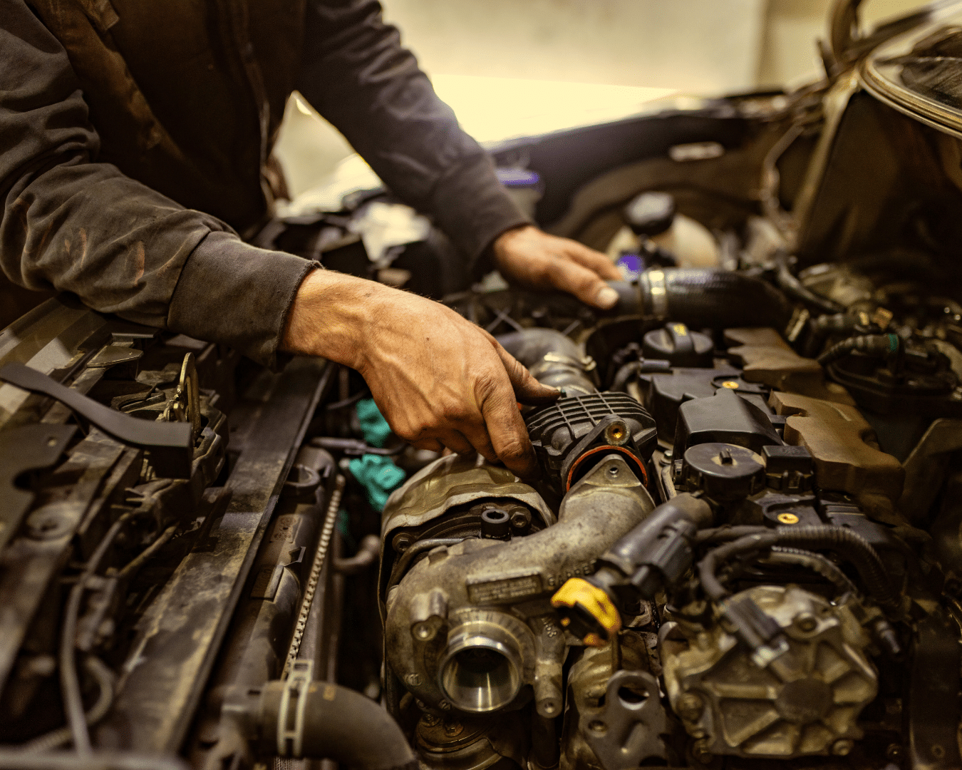 Cyber-Attack - mechanic working on an engine